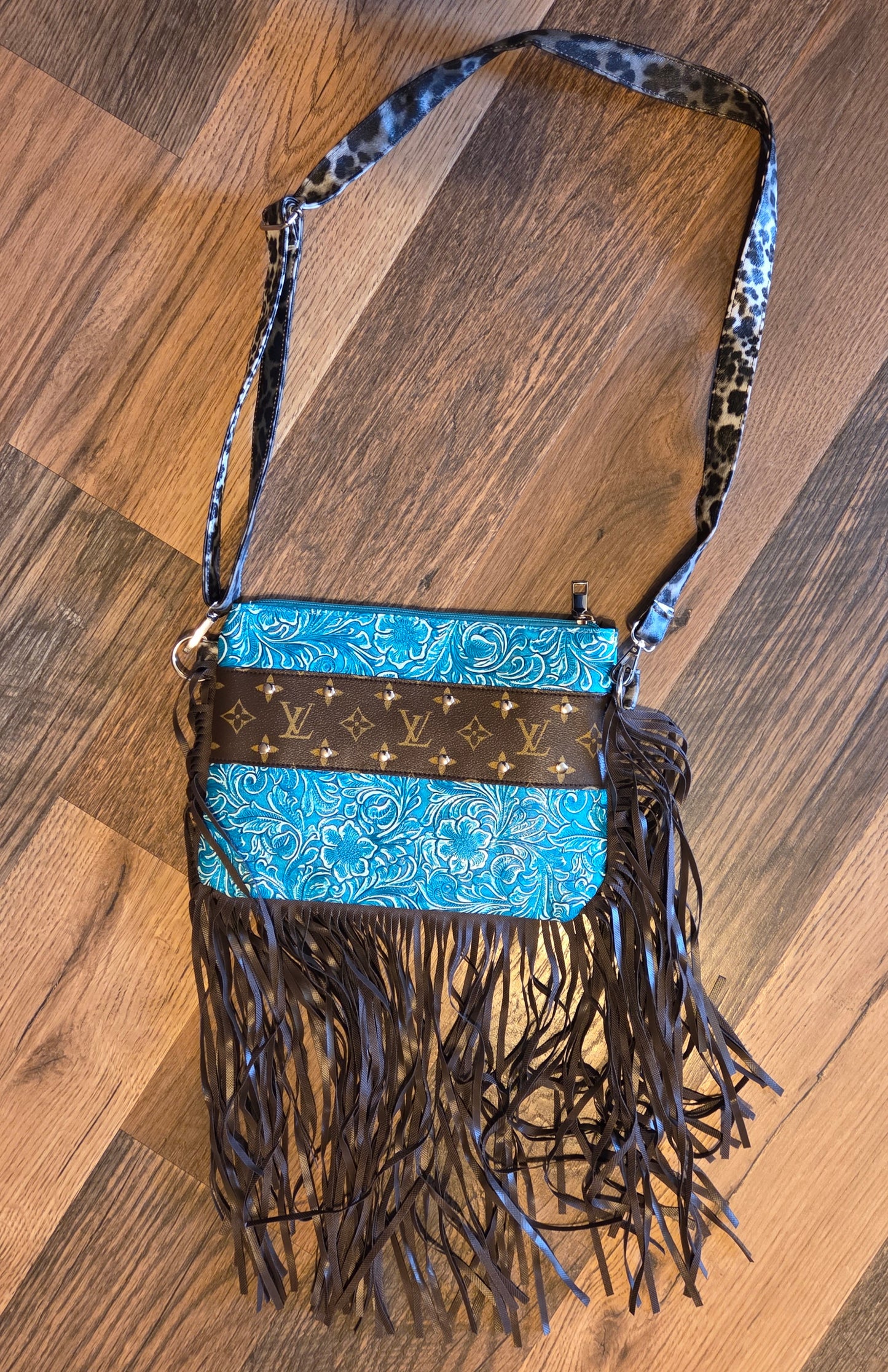 L V Teal Leopard Fringe Leather Purse